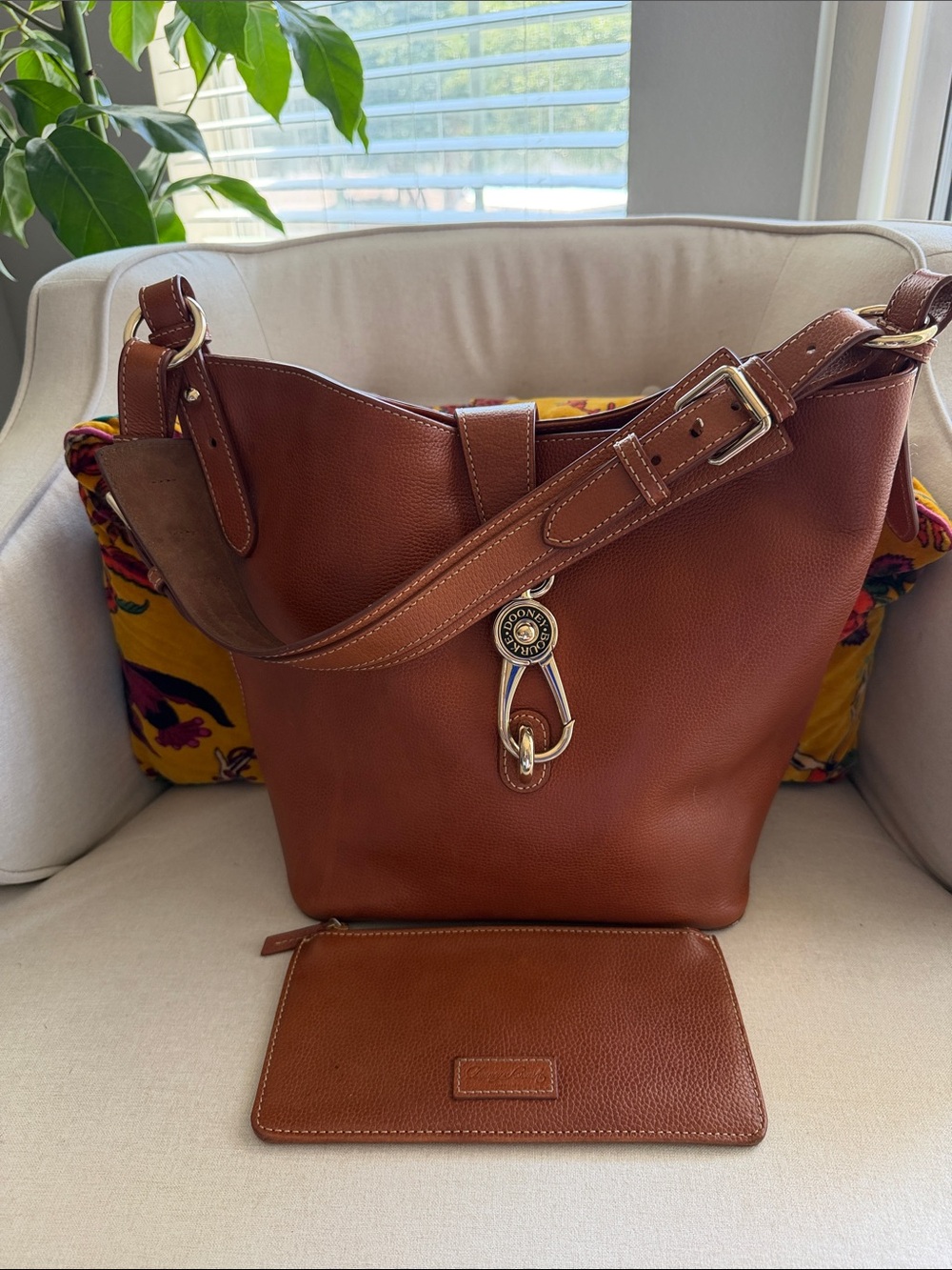 Dooney & Bourke Lily Bucket Bag with matching wallet.